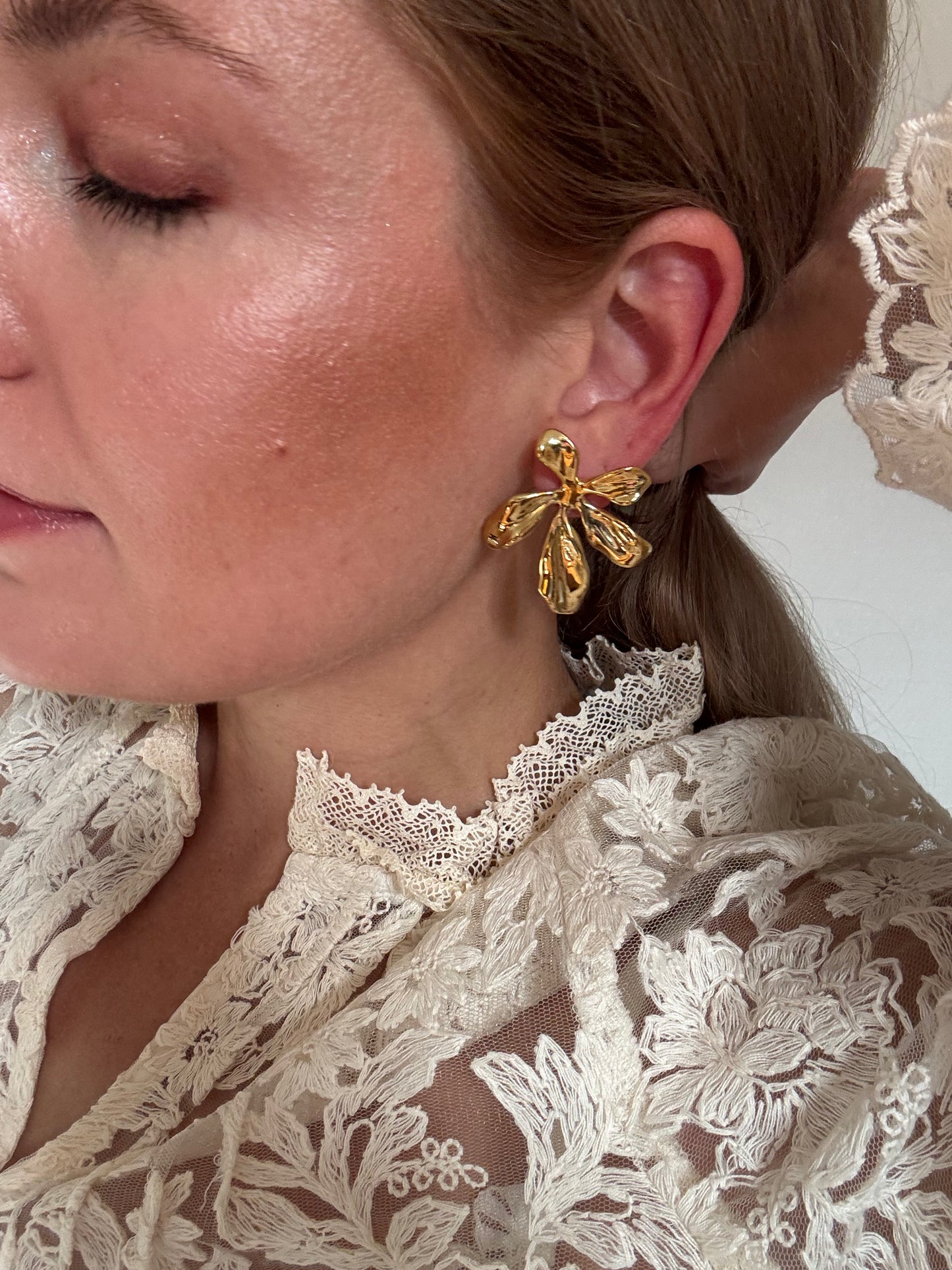 Boucles Fleuréa en acier inoxydable