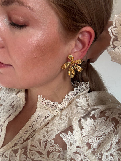Boucles Fleuréa en acier inoxydable
