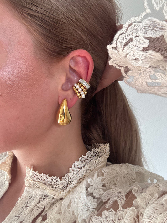 Boucles d’oreilles Goutte sculpturale en acier inoxydable doré
