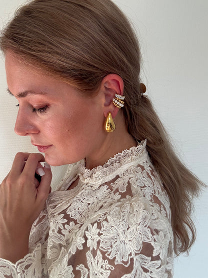 Boucles d’oreilles Goutte sculpturale en acier inoxydable doré
